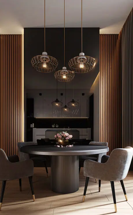 Salle à manger élégante avec table noire et suspensions design